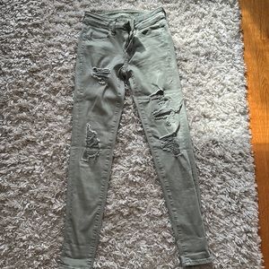 Light green ripped jeans